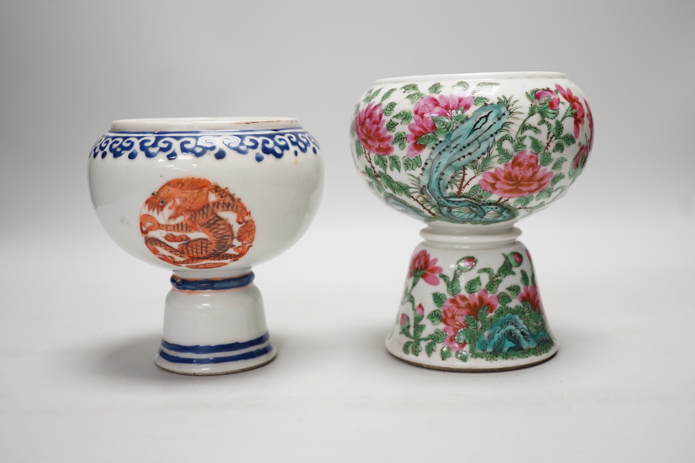 Two 19th century Chinese porcelain stem cups, The first decorated with Dragon medallions, the second with peonies and rock work, tallest 13.5cm
